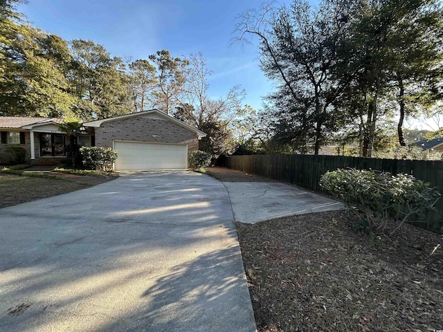 view of property exterior with a garage