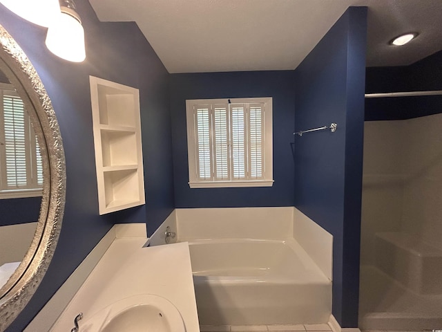 902 N 11th Ave N, North Myrtle Beach, SC 29582 - full bathroom with a garden tub, plenty of natural light, tile patterned floors, and a shower stall