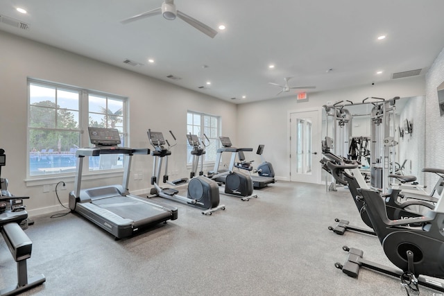 exercise room featuring ceiling fan and plenty of natural light