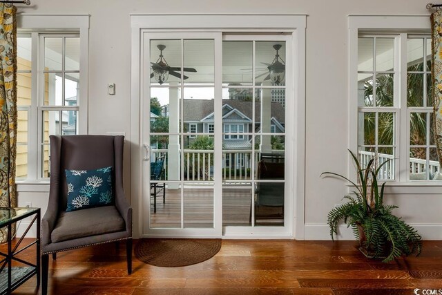 doorway with hardwood / wood-style floors