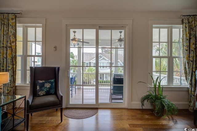 entryway featuring hardwood / wood-style flooring and ceiling fan