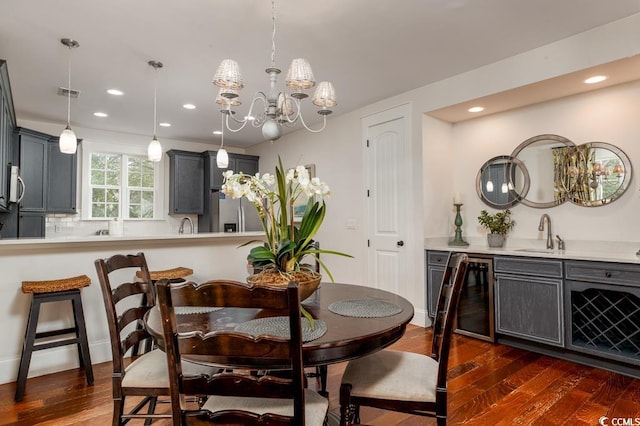 dining area featuring dark wood-style floors, wine cooler, visible vents, and recessed lighting