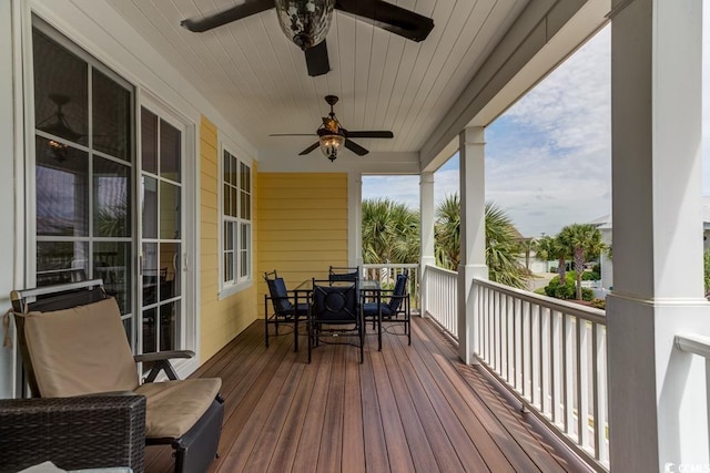 wooden deck with ceiling fan