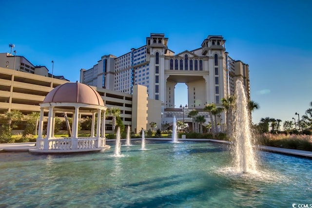 view of pool featuring pool water feature