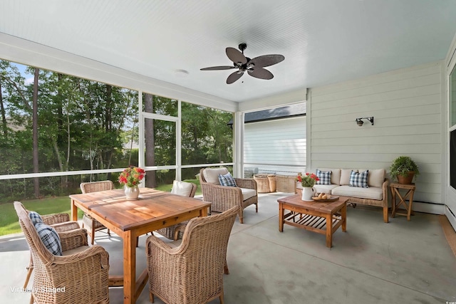 sunroom with ceiling fan