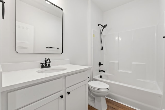 full bathroom featuring toilet, bathtub / shower combination, vanity, and wood-type flooring