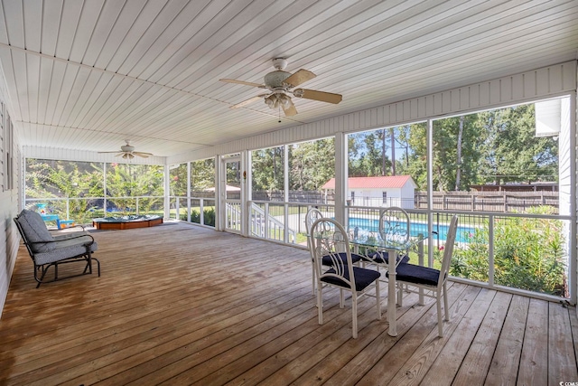 sunroom / solarium with ceiling fan