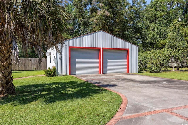 garage with a yard