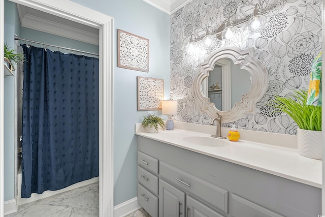 bathroom with vanity, curtained shower, and ornamental molding