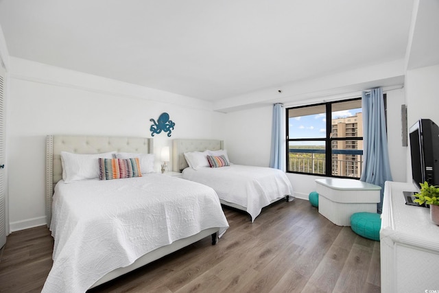 bedroom featuring wood-type flooring