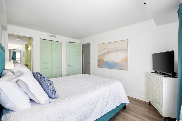 bedroom featuring hardwood / wood-style flooring