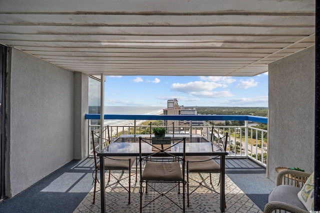 balcony featuring a water view