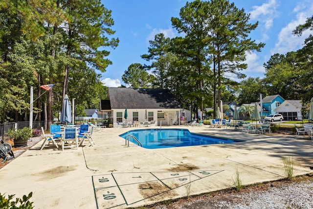 view of pool featuring a patio