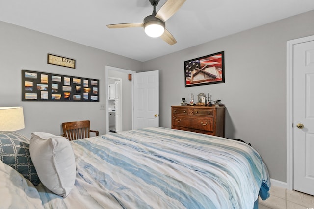 bedroom featuring ceiling fan and light tile patterned flooring