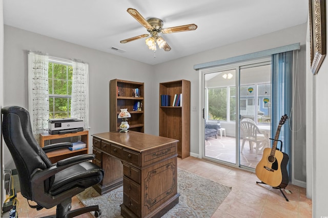 tiled office with ceiling fan