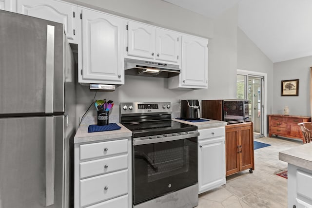 kitchen with white cabinetry, light tile patterned floors, lofted ceiling, and appliances with stainless steel finishes