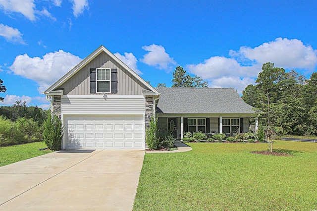 view of front of home featuring board and batten siding, driveway, and a front lawn