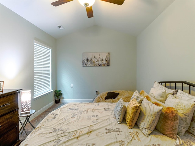 bedroom with lofted ceiling, baseboards, visible vents, and a ceiling fan