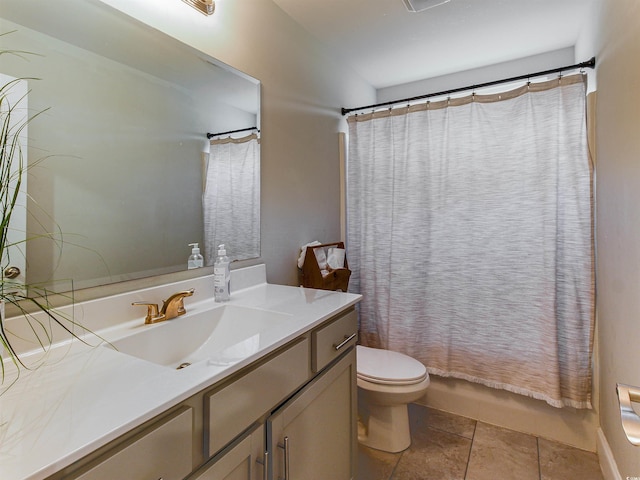 bathroom with toilet, shower / tub combo, vanity, and tile patterned floors