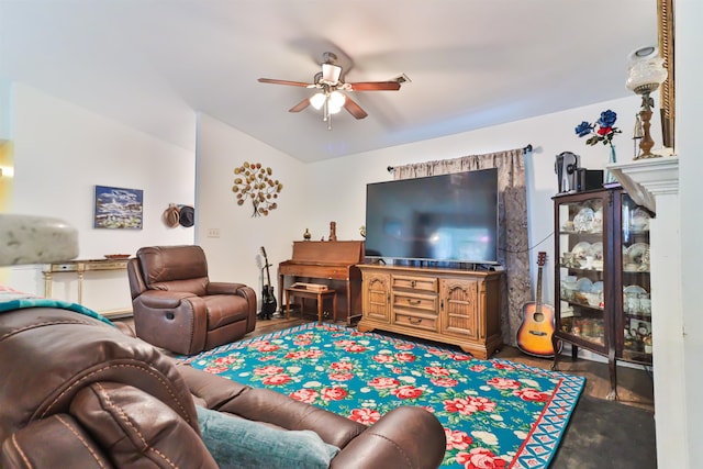 living room with ceiling fan and hardwood / wood-style flooring