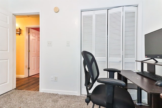 view of carpeted office space