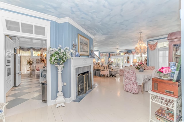 interior space with crown molding and a notable chandelier