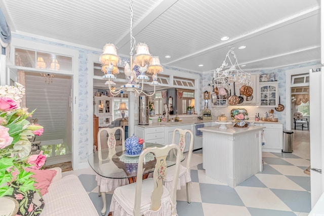 dining room with a notable chandelier