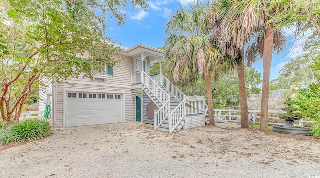 view of front of home with a garage