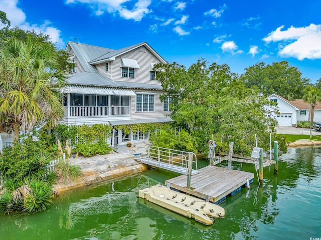 view of dock with a water view