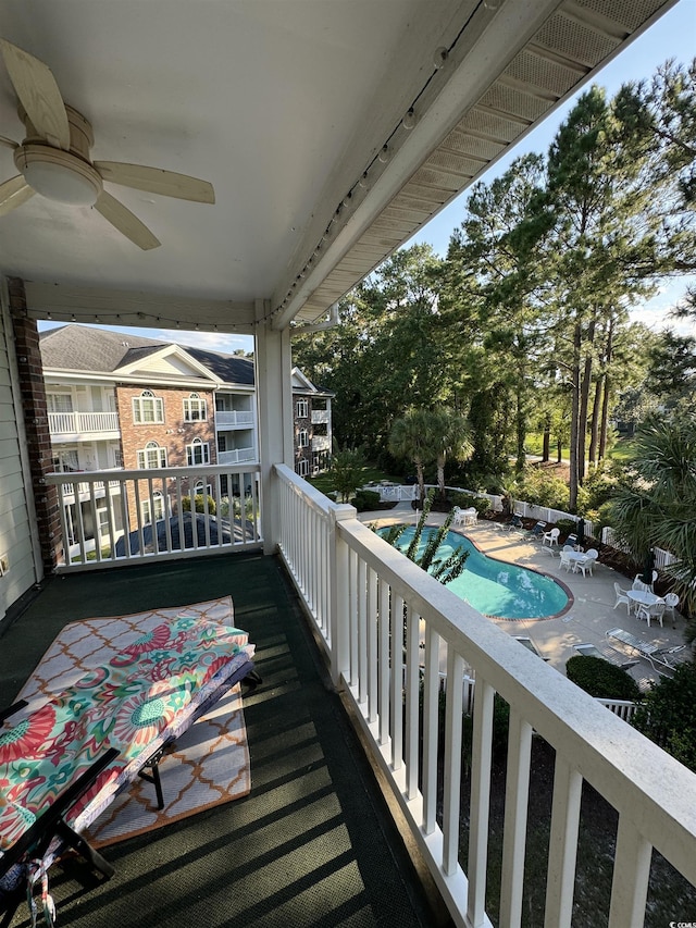 balcony featuring ceiling fan