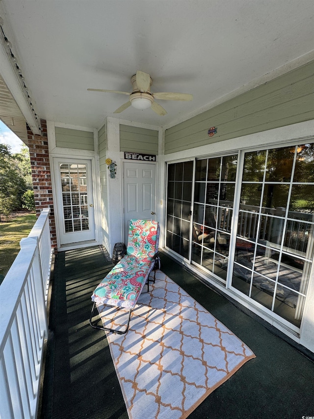 balcony featuring a ceiling fan