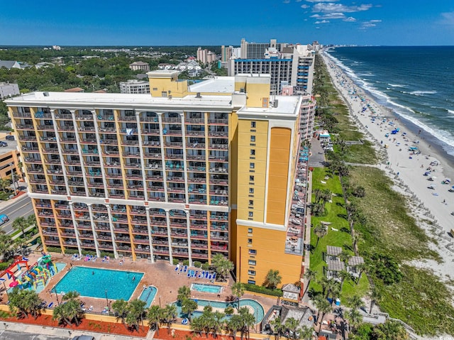 drone / aerial view with a view of the beach and a water view