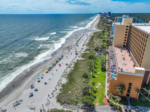 bird's eye view featuring a beach view and a water view