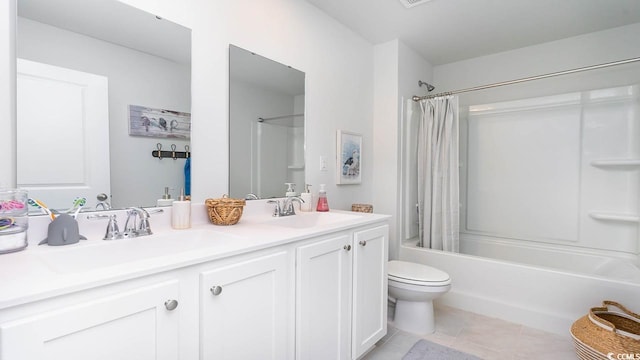 full bathroom featuring vanity, toilet, tile patterned floors, and shower / bath combination with curtain