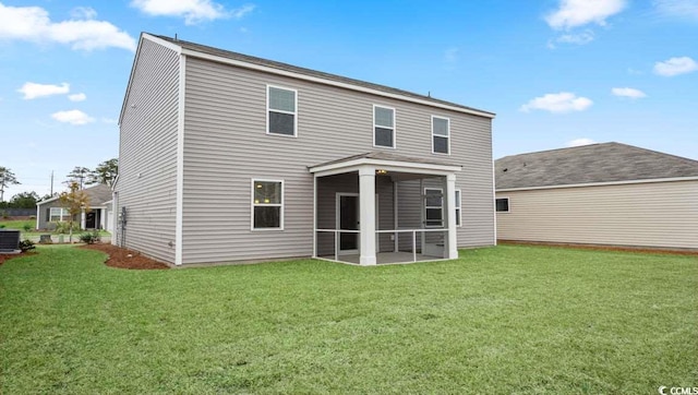 back of house with a sunroom, central AC unit, and a yard