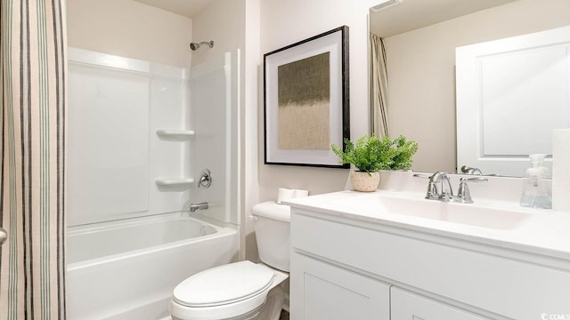 full bathroom featuring vanity, toilet, and shower / tub combination