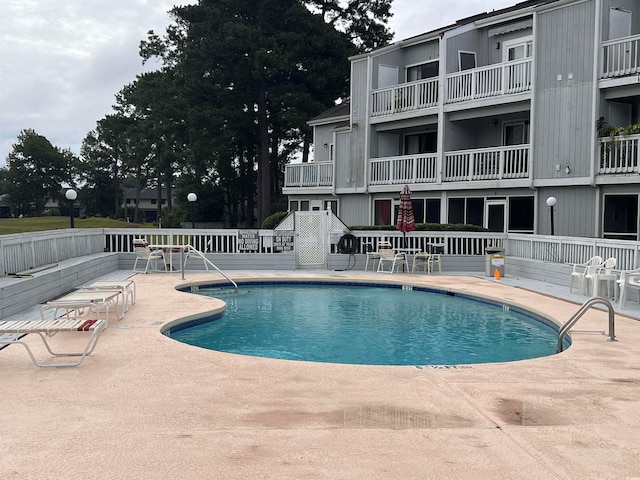 view of pool with a patio area