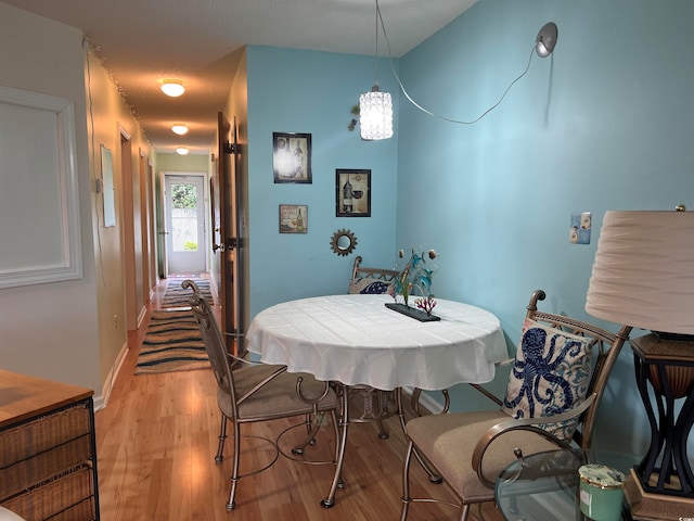 dining area featuring light hardwood / wood-style flooring