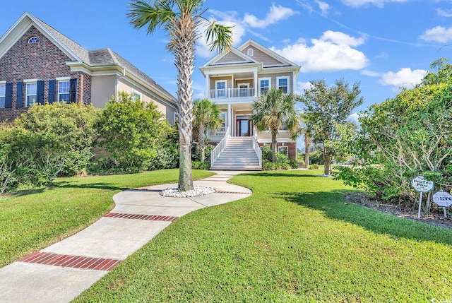 view of front of property with a front lawn and a porch