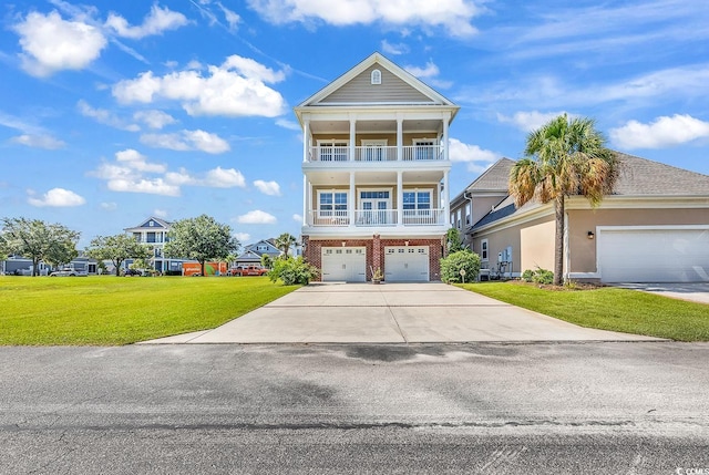 view of front facade featuring a garage and a front yard