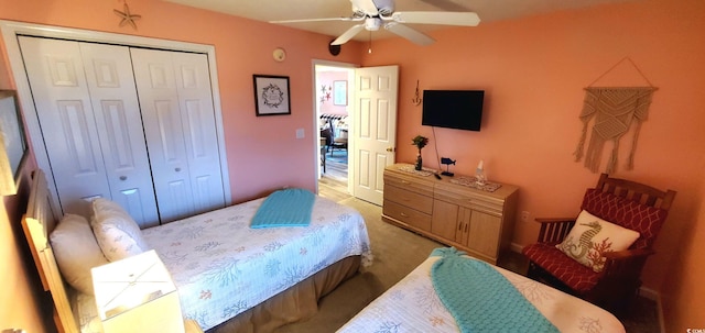 bedroom featuring ceiling fan and a closet