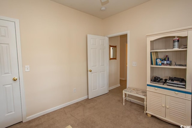 bedroom featuring light colored carpet