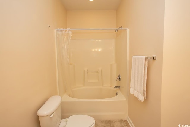 bathroom with shower / bath combination with curtain and toilet