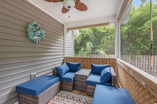 exterior space featuring ceiling fan