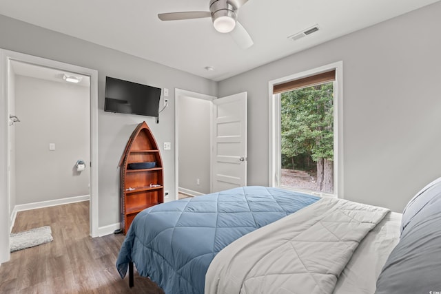 bedroom featuring hardwood / wood-style floors and ceiling fan