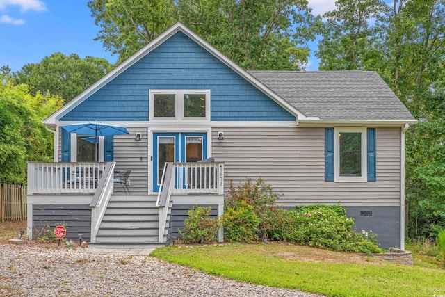 view of front of home with a deck