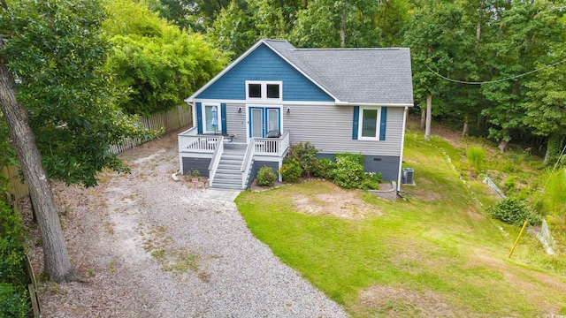 bungalow-style house with a front lawn