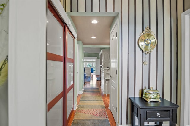 corridor with dark wood-type flooring