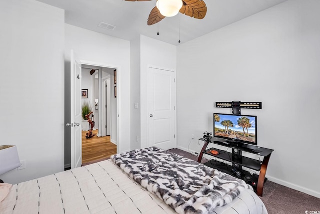 carpeted bedroom featuring ceiling fan