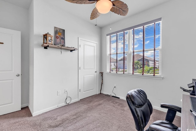 office area featuring ceiling fan and light colored carpet